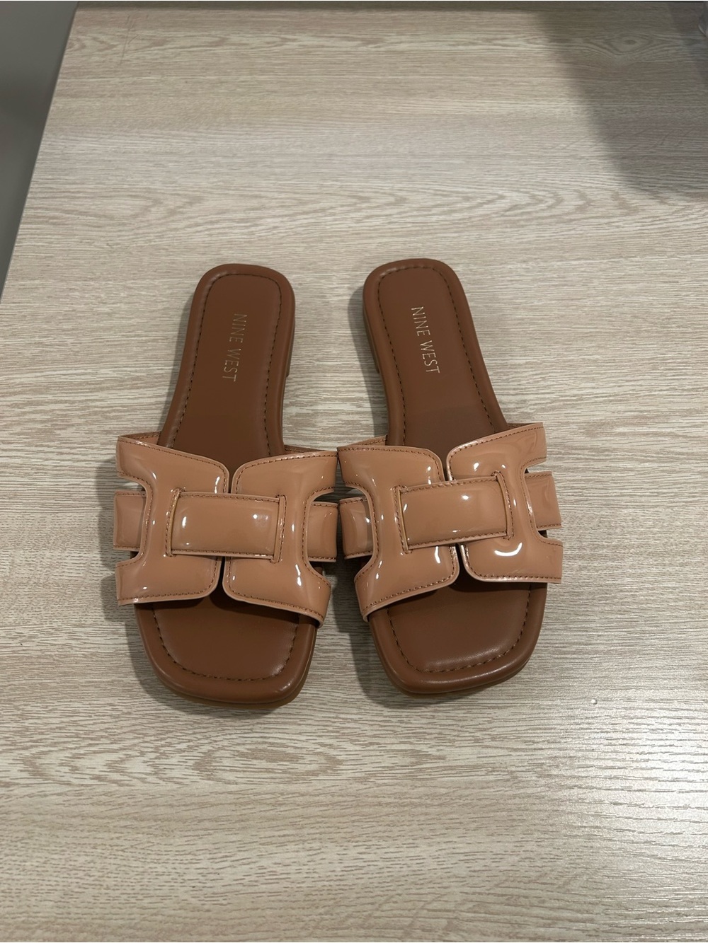 Nine West glossy tan slides